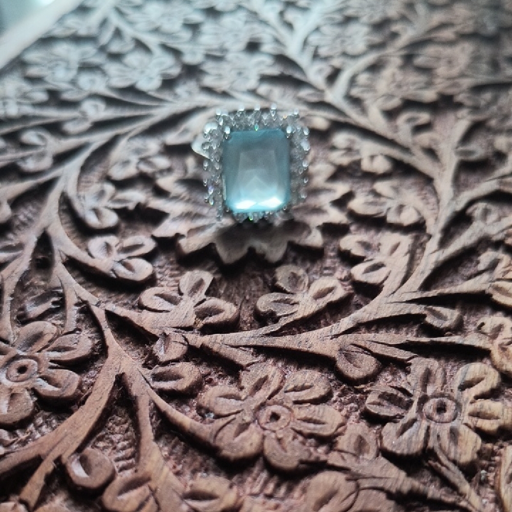 Radiant Silver Ring with Blue Gemstone